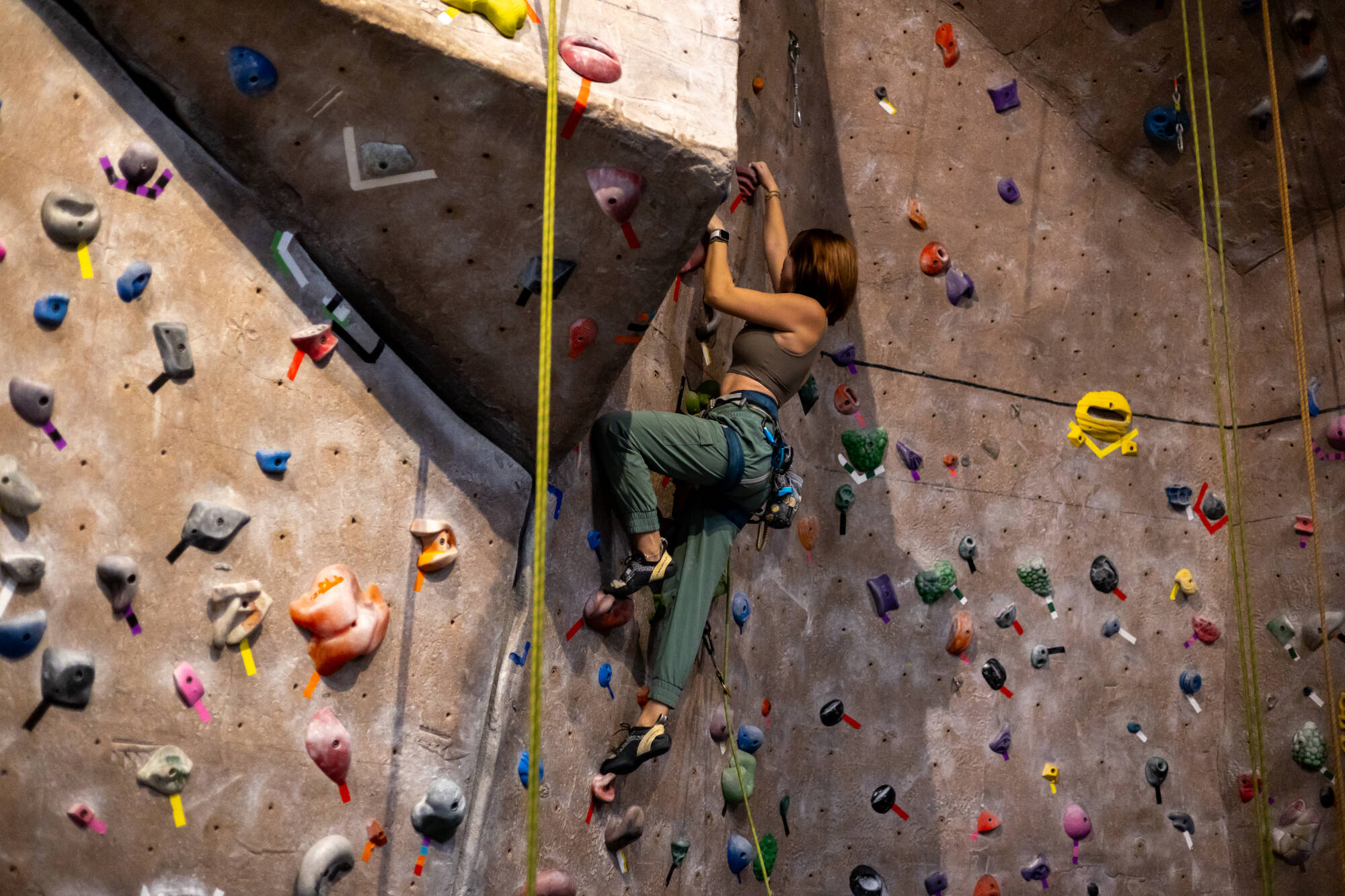person climbing at the climbing center